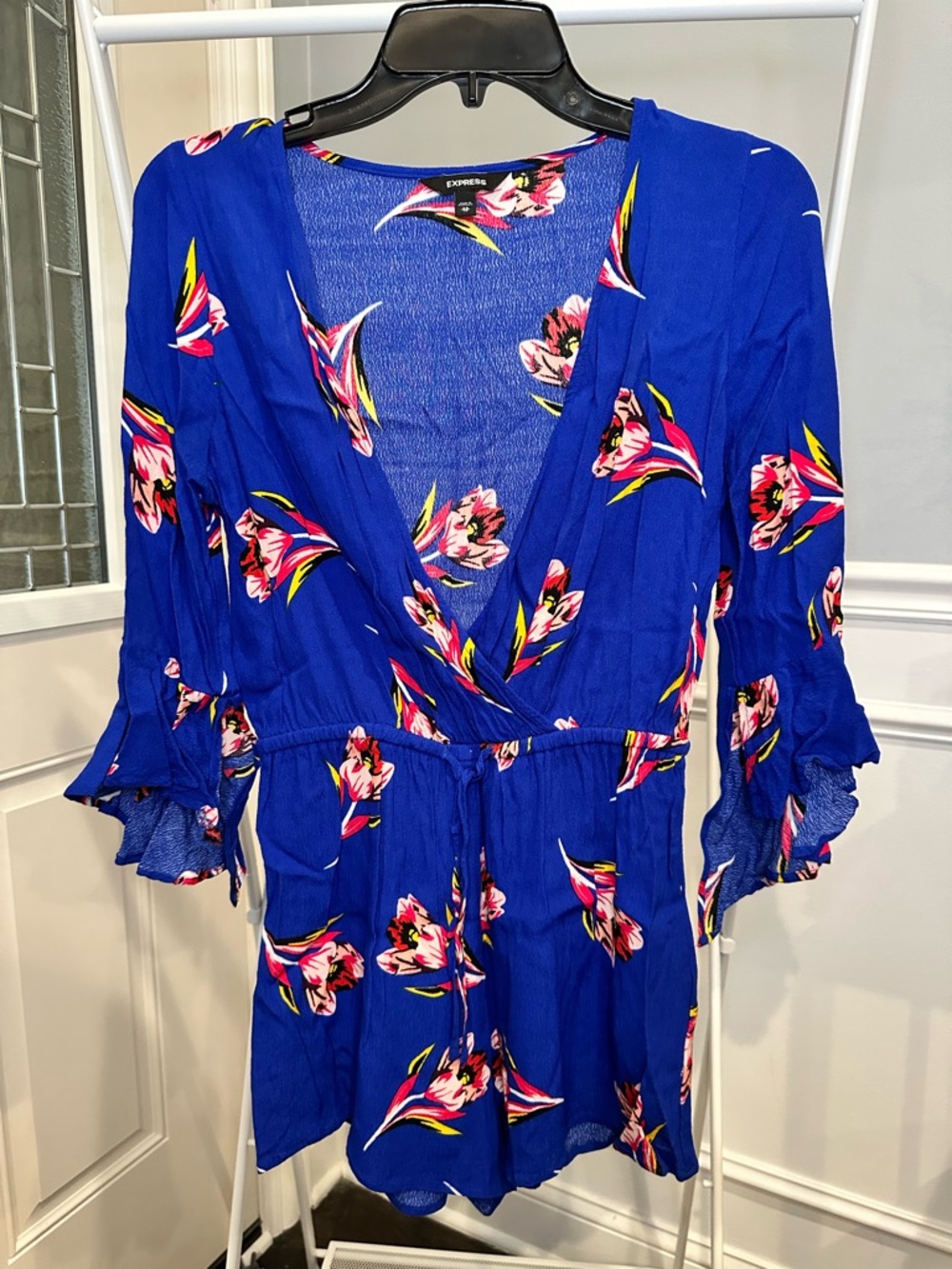 NWOT Express Blue Floral Wrap Romper with Pink and Yellow Accents